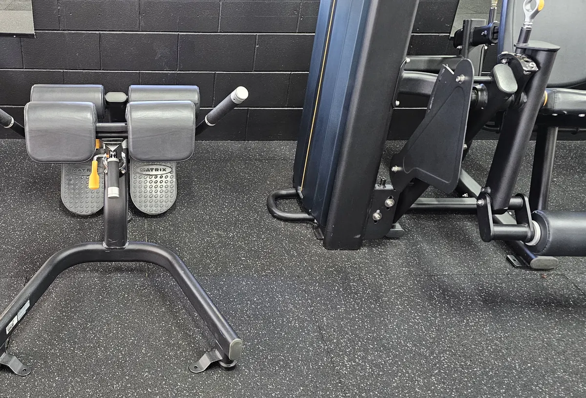 A back extension bench on the rubber floor at Get Fit Burdekin